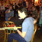 Fred on Larry's Guitar as crowd closes in